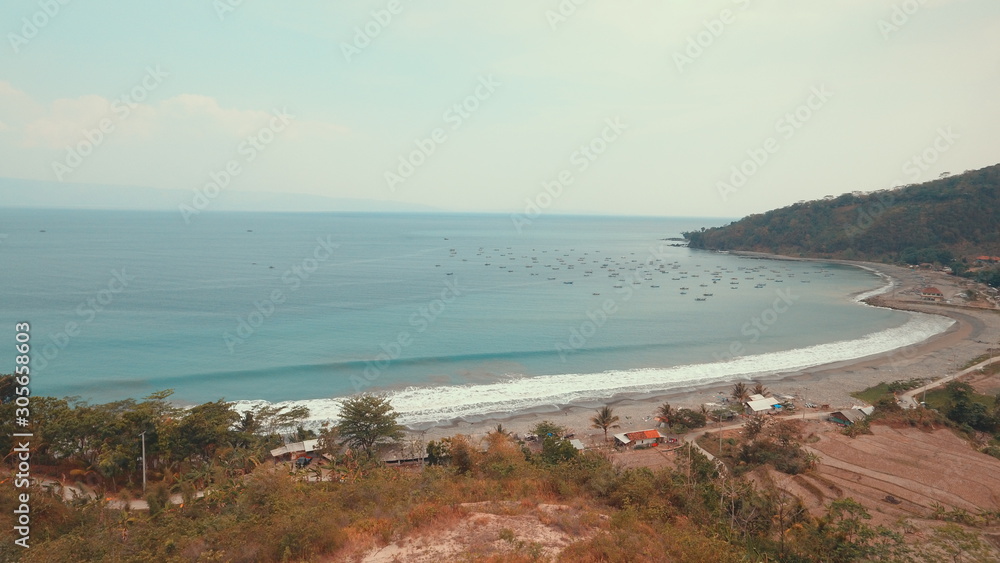 beautiful indonesian beach with calm sea