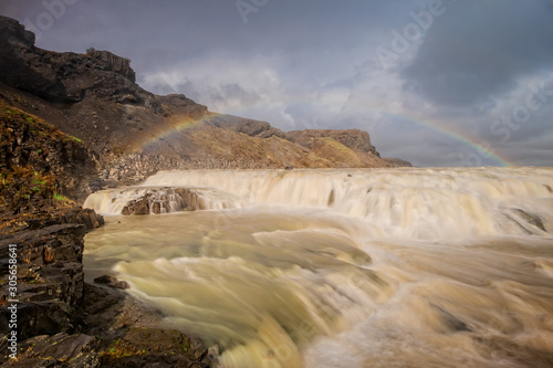 Amazing Gullfoss waterfall with rainbow in Iceland. Long exposure. September 2019
