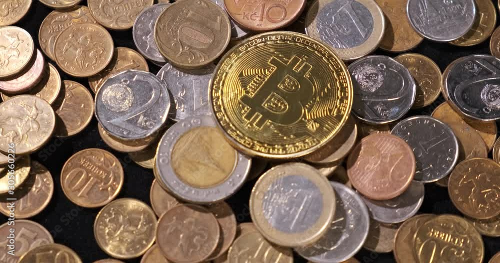 Shabby coins in bulk lie on rough rotating surface, coins from Europe and Asia, rubles, euros, lari, gold coin with bitcoin symbol, macro, expenses, crisis, falling prices, payment, future currency Shabby coins in bulk lie on rough rotating surface, coins from Europe and Asia, rubles, euros, lari, gold coin with bitcoin symbol, macro, expenses, crisis, falling prices, payment, future currency