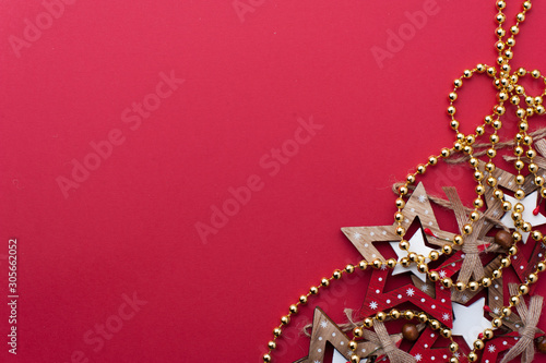 Wooden Christmas Stars on Red Background