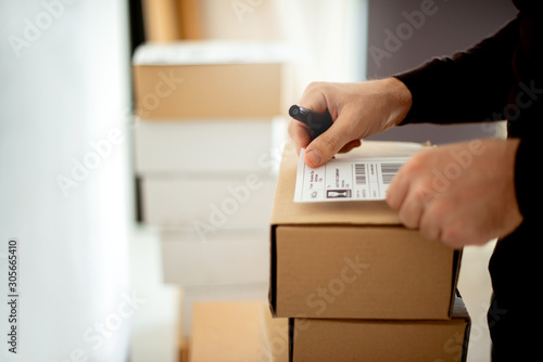 Delivery service, applying a shipping label