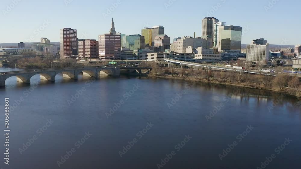 Drone Aerial Downtown Hartford Cityscape Climbing Over River flying into traffic interchange Drone Aerial Downtown Hartford Cityscape Climbing Over River flying into traffic interchange