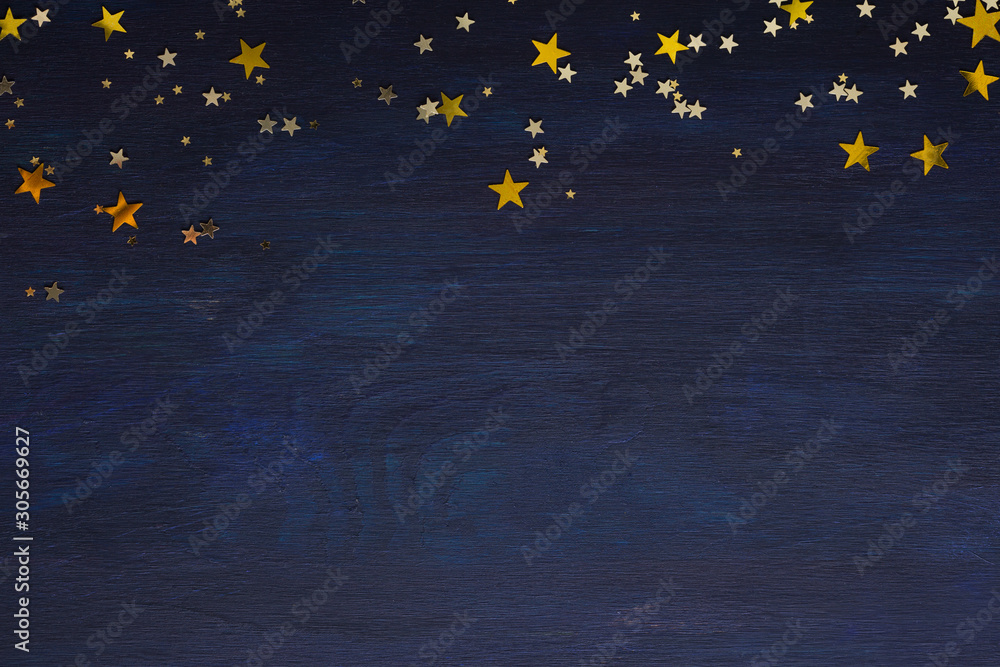 Dark-blue wooden background with golden stars with copy space for text. - obrazy, fototapety, plakaty 