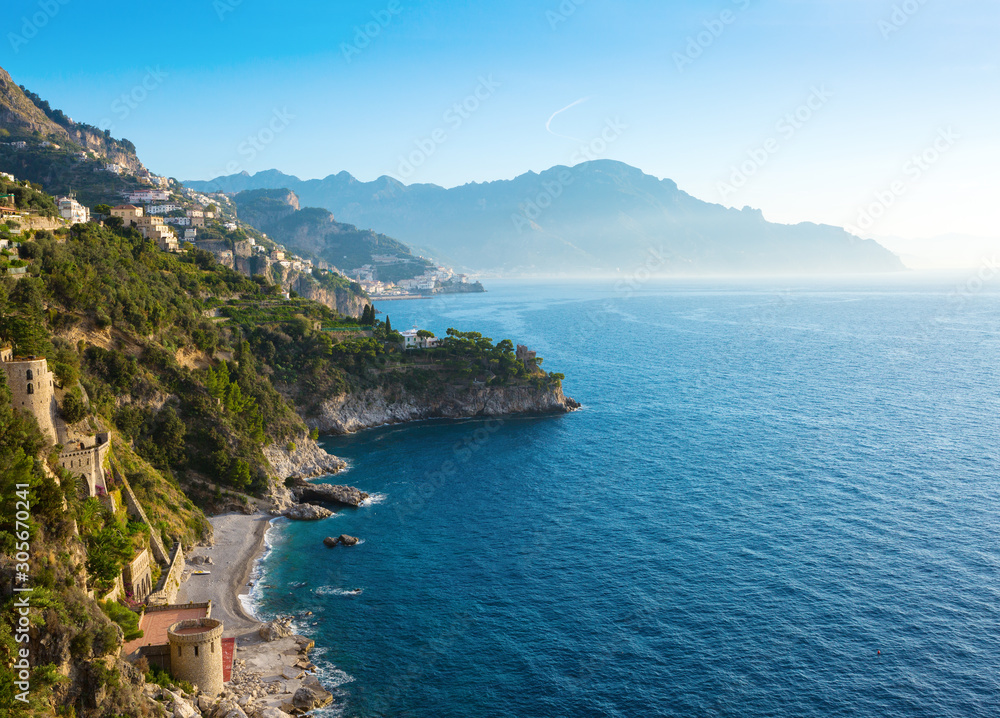 A picturesque  view of  the Amalfi Coast from the Conca dei Marini with morning mist above the sea, Campania, Italy.