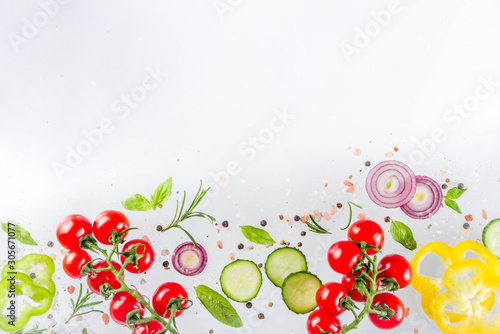 Fresh vegetables, herbs and spices on white background