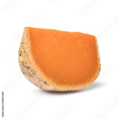 Wedge of French Mimolette cheese