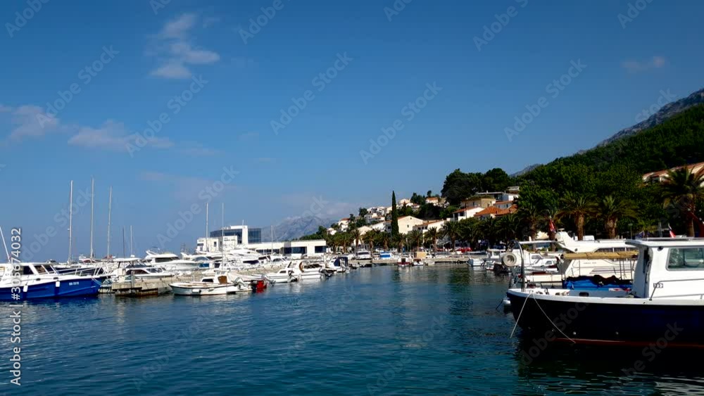 Sea bay with anchoring sailing boats for luxury tourists Sea bay with anchoring sailing boats for luxury tourists