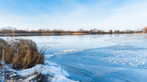 beautiful winter landscape of ice-covered river