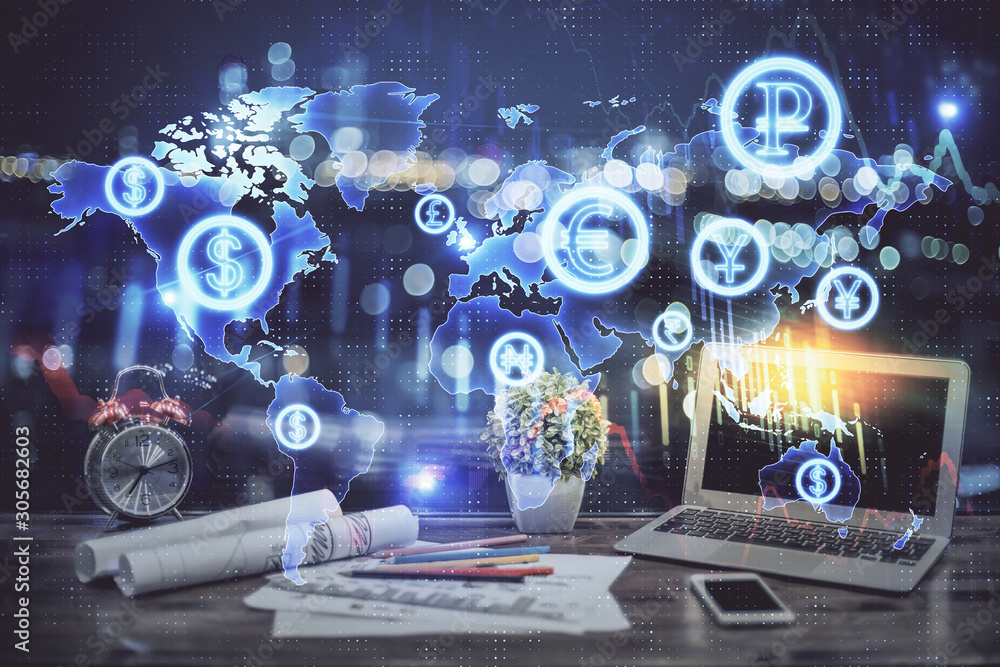 Fototapeta premium Financial graph colorful drawing and table with computer on background. Double exposure. Concept of international markets.