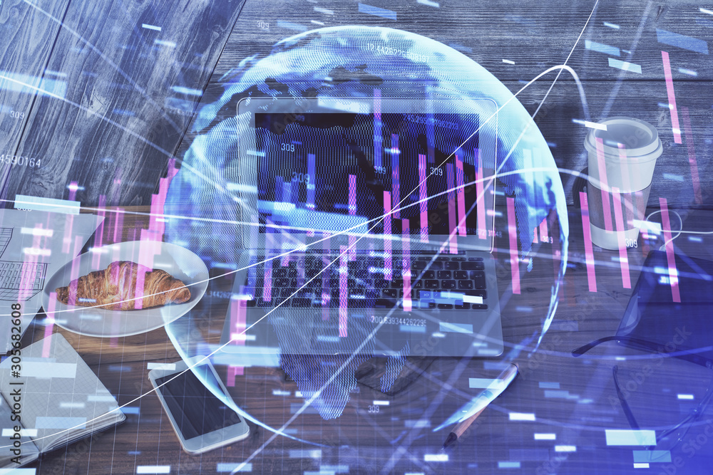 Multi exposure of graph and financial info and work space with computer background. Concept of international online trading. Multi exposure of graph and financial info and work space with computer background. Concept of international online trading.