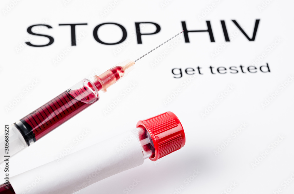 Sample blood in syringe and blood tube. Sample blood in syringe and blood tube.