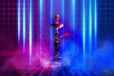 Hookah with smoke on a background of an empty abstract scene. Reflection of neon lights