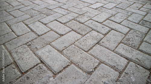 road paving in the form of a city square, a method of substituting asphalt that is more cost-effective and environmentally friendly