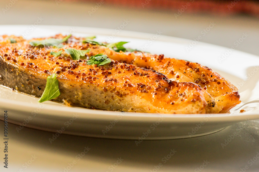 cook salmon in white plate with honey and mustard cook salmon in white plate with honey and mustard