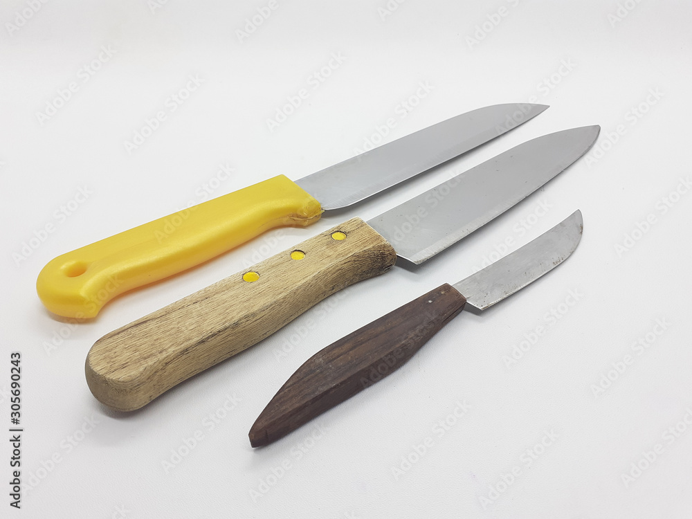 Handheld Sharp ans Shiny Metallic Stainless Steel Knife as Cutting Tools for Kitchen Utensils in White Isolated Background Handheld Sharp ans Shiny Metallic Stainless Steel Knife as Cutting Tools for Kitchen Utensils in White Isolated Background