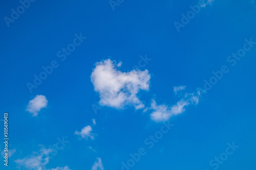 Blue sky with clouds on a clear day and good weather in the morning  fluffy and soft white clouds