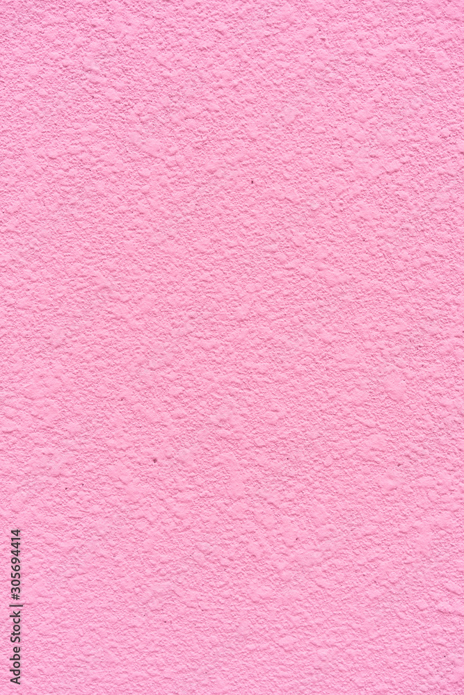 background from texture closeup of decorative plaster on a pink wall surface background from texture closeup of decorative plaster on a pink wall surface