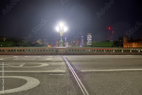 London, United Kingdom - November 24, 2019: Night view on the London Skyline at Thamse River photo