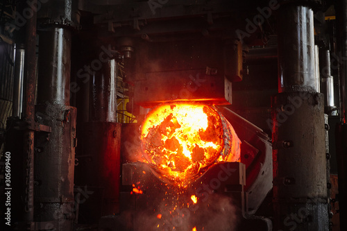 Forging a workpiece on a forging press. Forging production.