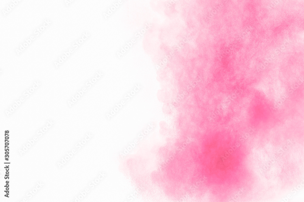 Pink powder explosion on white background.Pink dust splashing.