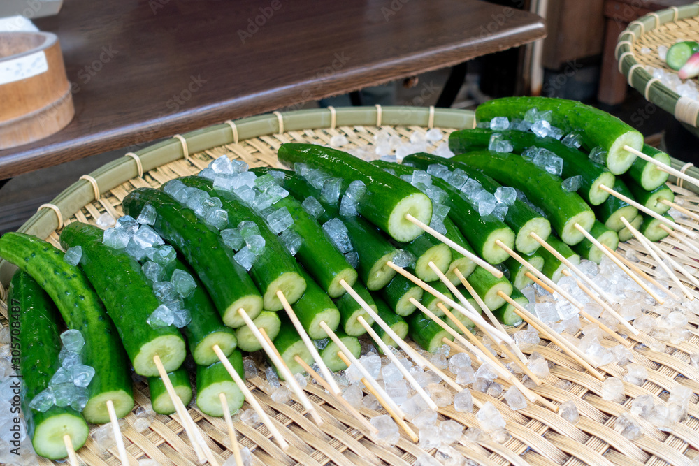 Ice cold Japanese cucumber on a stick, or known as "kyuri asa zuke" is