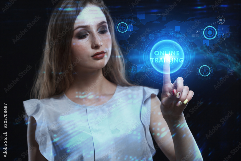 Business, Technology, Internet and network concept. Young businessman working on a virtual screen of the future and sees the inscription: Online training Business, Technology, Internet and network concept. Young businessman working on a virtual screen of the future and sees the inscription: Online training