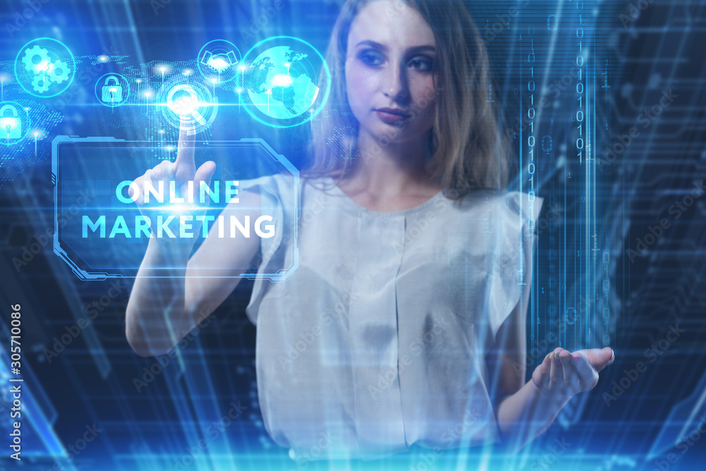 Business, Technology, Internet and network concept. Young businessman working on a virtual screen of the future and sees the inscription: Online marketing Business, Technology, Internet and network concept. Young businessman working on a virtual screen of the future and sees the inscription: Online marketing