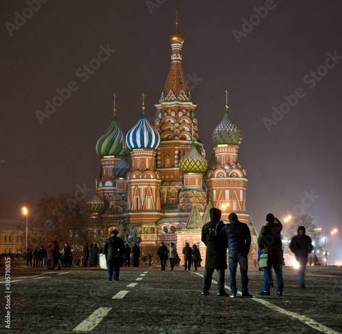 Moscow, Russia - December 18, 2017: Saint Basil's cathedral on Red Square in Moscow. Popular landmark, UNESCO world heritage site. Night winter photo with people. Faceless people