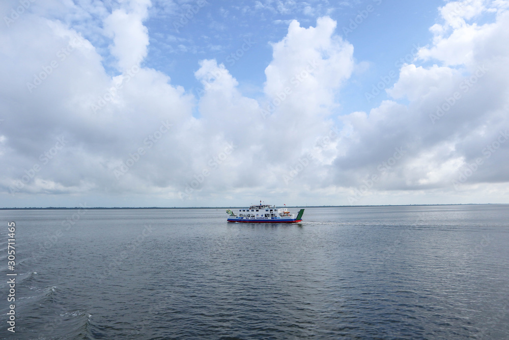 Ferry Transport sailing on the sea or strait