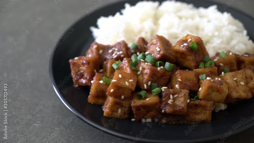 fried tofu with spicy sauce on rice fried tofu with spicy sauce on rice