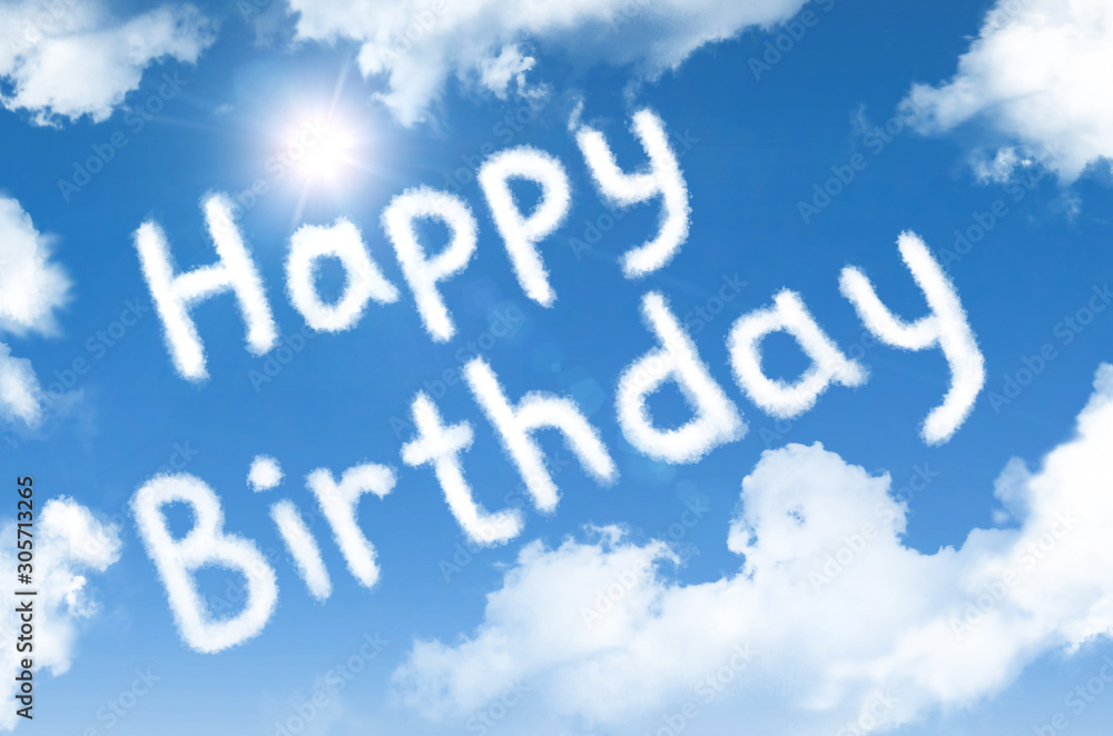 Happy birthday cloud words in the sky with a bright sun. Happy birthday cloud words in the sky with a bright sun.