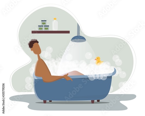 African American man taking bath in bathroom with rubber duck. Wash head, hair, body, skin with shampoo, soap, sponge, water. Bathtub full of foam with bubbles. Hygiene, everyday routine, relax
