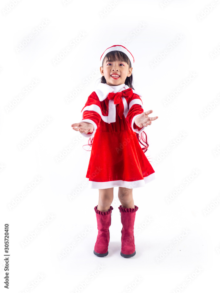 Asian girl is wearing a Santa costume to celebrate Christmas. White background