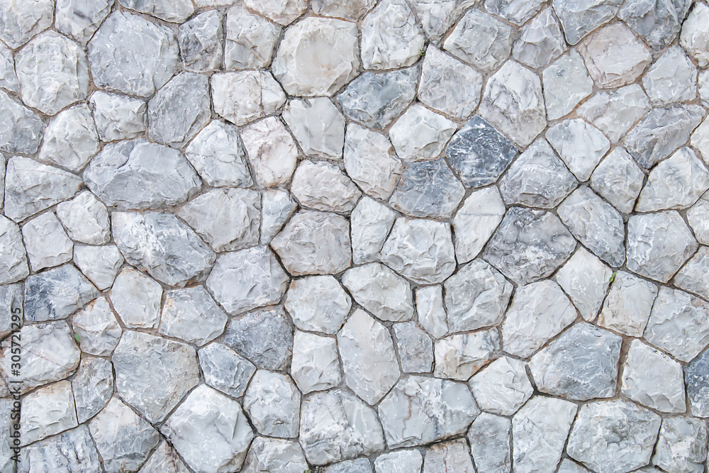 The wall background is made of natural granite. The wall background is made of natural granite.