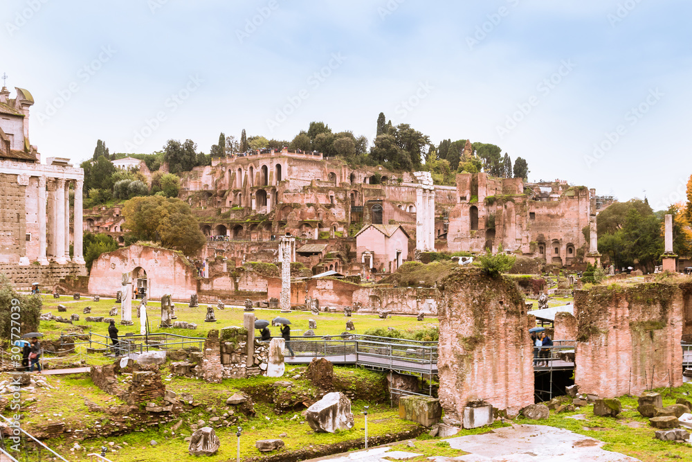 Roman Forum, Forum Romanum in Latin, a rectangular square surrounded by the ruins of several important ancient government buildings at the center of Rome in Italy.