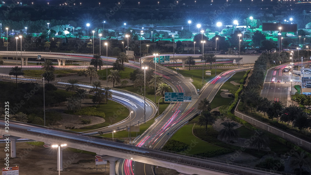 Fototapeta premium Aerial top view to Sheikh Zayed road near Dubai Marina and JLT timelapse, Dubai.