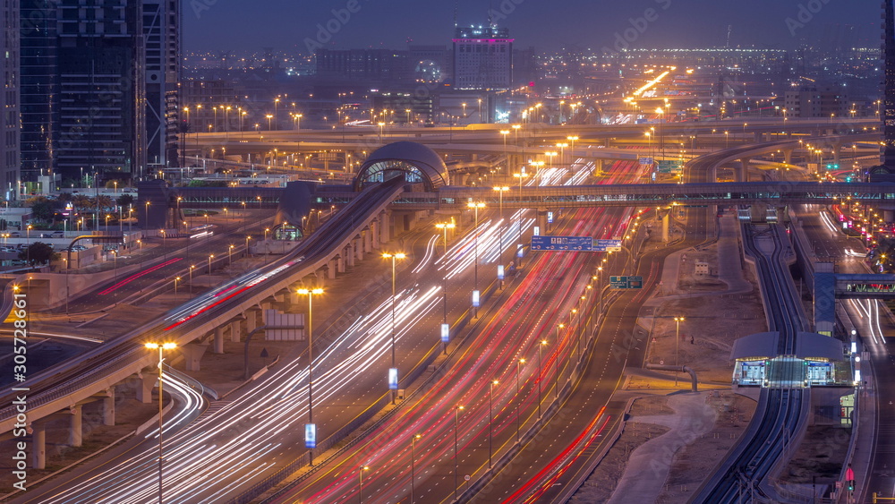 Aerial top view to Sheikh Zayed road near Dubai Marina and JLT night to day timelapse, Dubai.