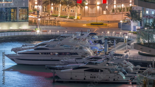 Photography Waterfront promenade in Dubai Marina aerial night timelapse