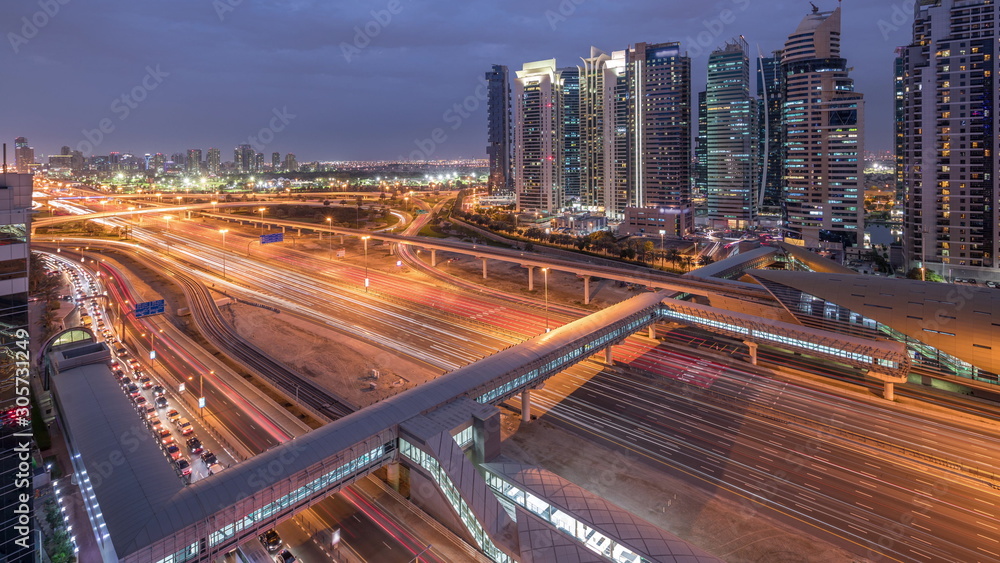 Aerial top view to Sheikh Zayed road near Dubai Marina and JLT day to night timelapse, Dubai.