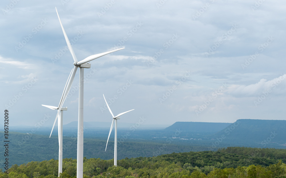 Wind turbines on yellow sky Wind turbines on yellow sky