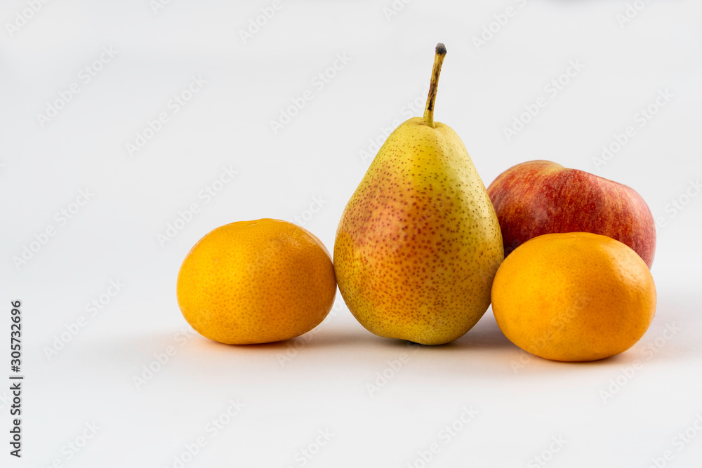 tangerines, pear and apple on white background tangerines, pear and apple on white background