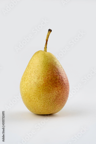 ripe pear, with red and green colors, on white background