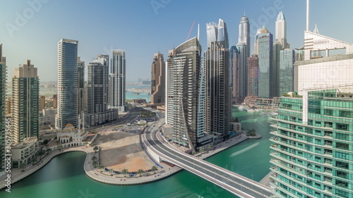 Aerial view of Dubai Marina residential and office skyscrapers with waterfront timelapse © neiezhmakov