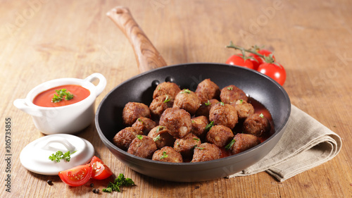 fried meatball with tomato sauce