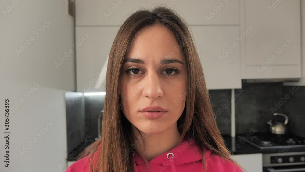 girl shocked and surprised. A girl in surprise blink and looks at the camera. 4k girl shocked and surprised. A girl in surprise blink and looks at the camera. 4k