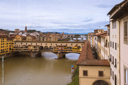 Firenze cityscape with the Goldsmiths Bridge across the Arno river.