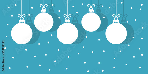 Christmas baubles hanging white ornaments on blue snowing winter background.