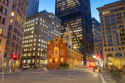 Old State House on historic Freedom Trail at night in blue hour in downtown Boston, Massachusetts, MA, MA, USA. This building was built in 1713 and is the oldest surviving public building in USA.