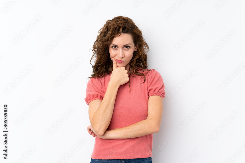 Young pretty woman over isolated background thinking Young pretty woman over isolated background thinking