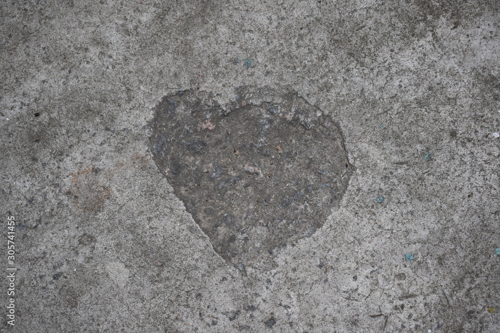 Naklejka premium Background texture gray stone heart